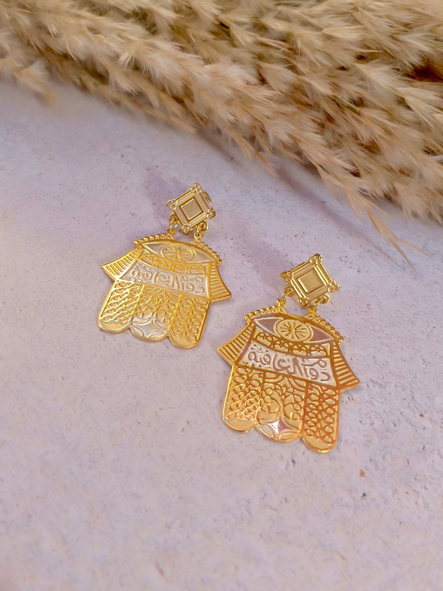 دوام العافيه earrings