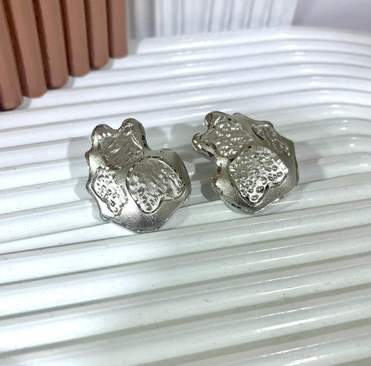 Shimmering Teddy Silver Studs.
