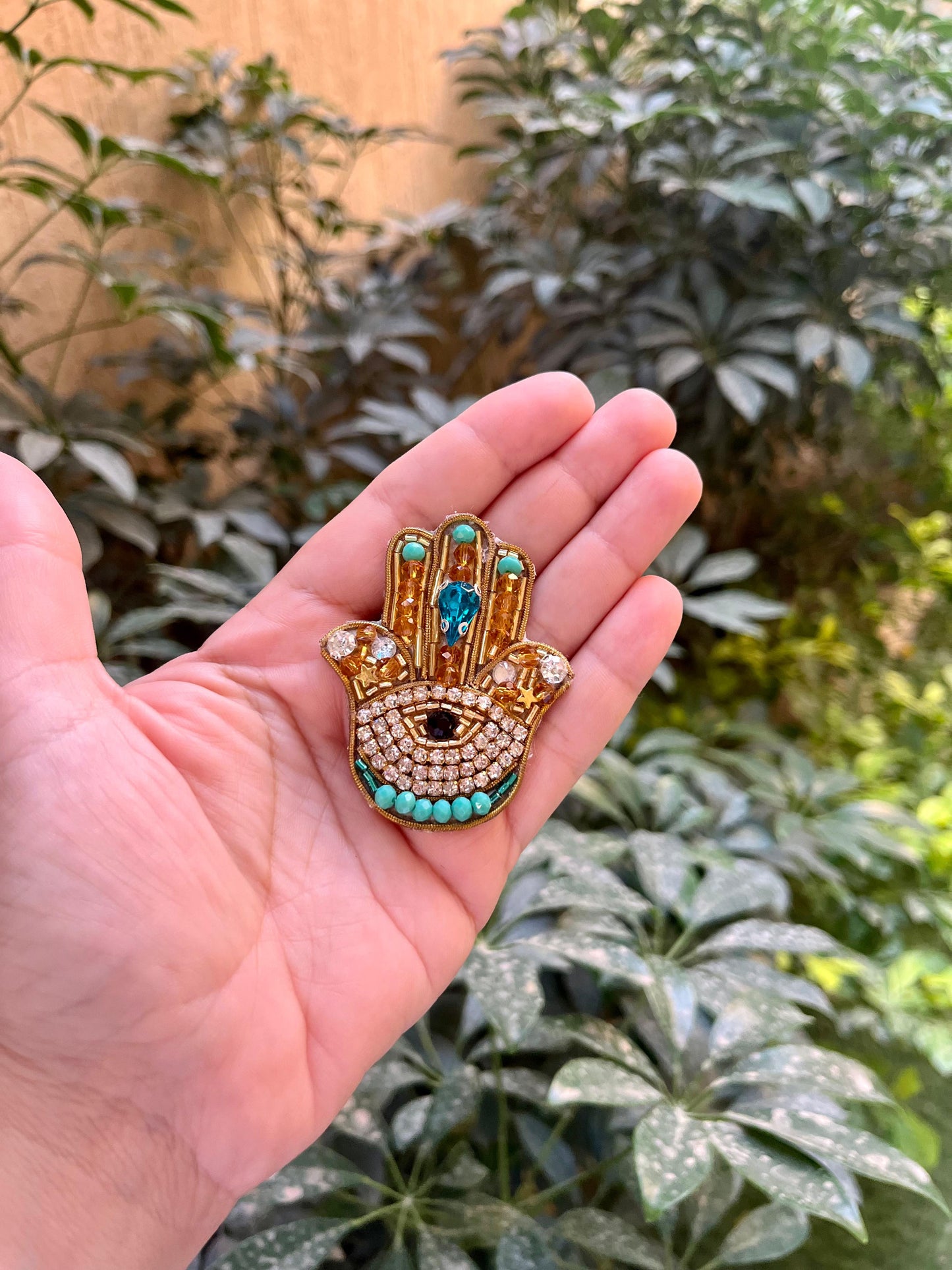 The Golden Hamsa Protection magnet Pin