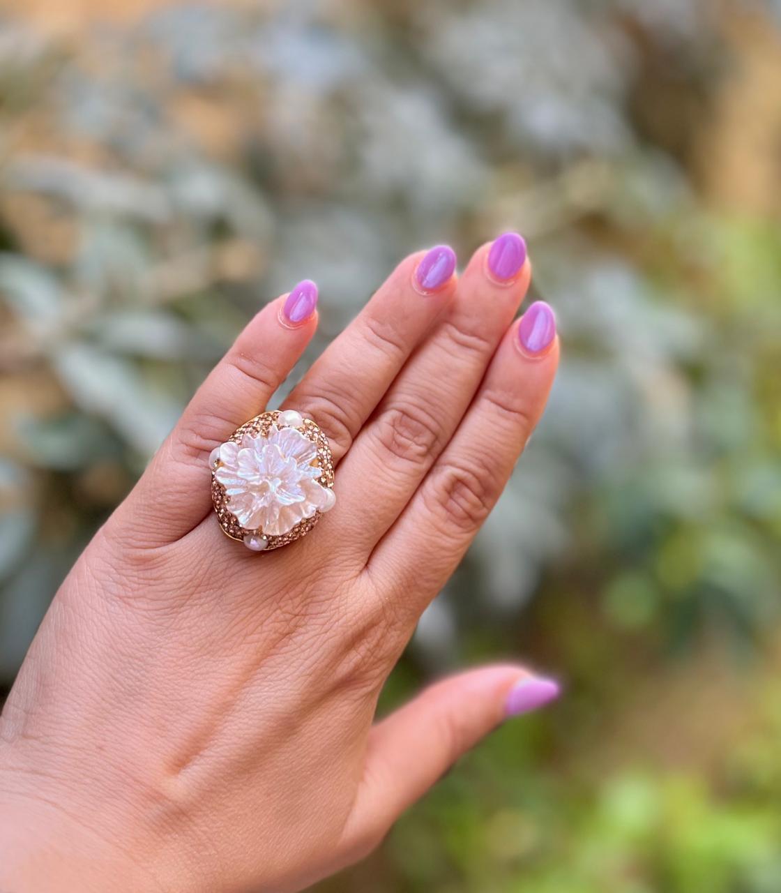 The Nacreous Bloom Ring
